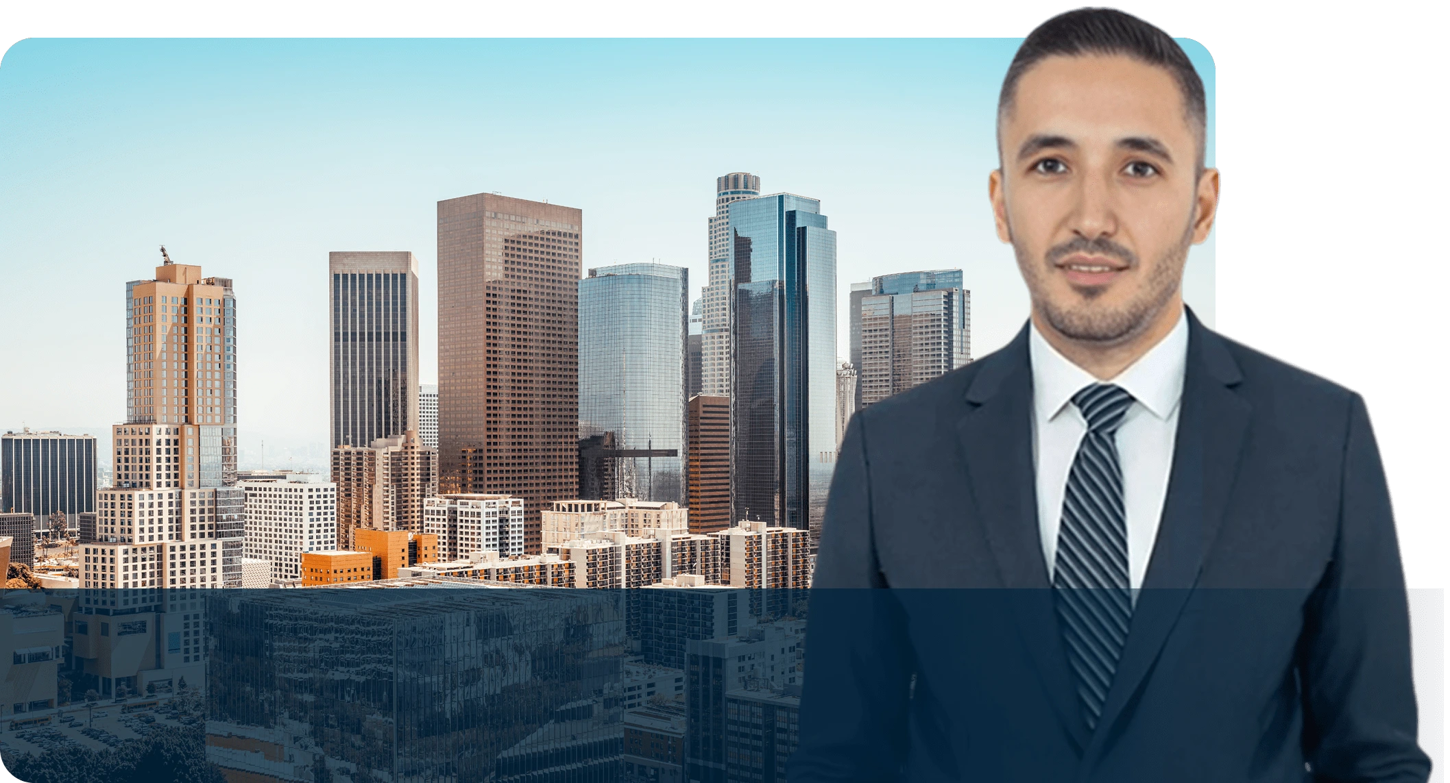 A man in a suit and tie standing next to a city.