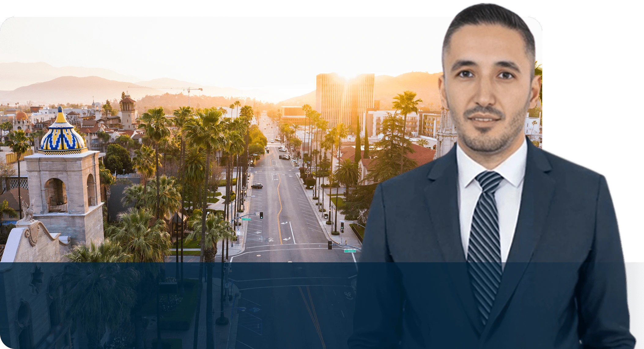 A man in a suit standing on the side of a road.